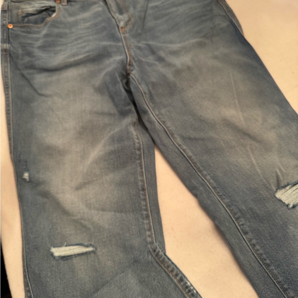 Distressed Blue Denim Jeans